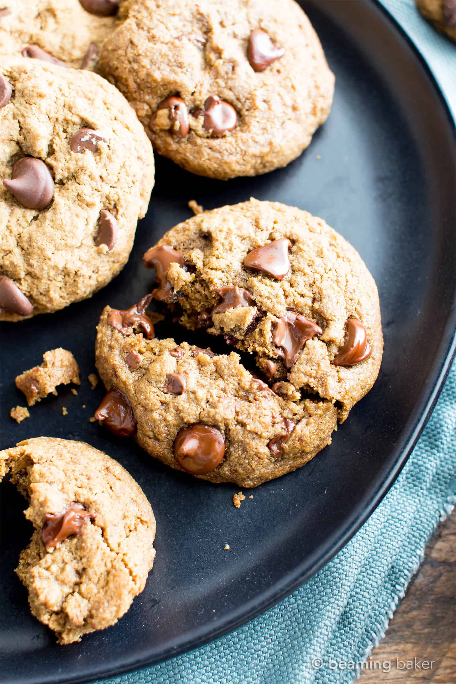 Vegan Chocolate Chip Cookies Recipe (V, GF): Chewy on the inside, crispy on the edges, and packed with rich chocolate. My favorite chocolate chip cookies! #Vegan #GlutenFree #DairyFree #Cookies #Dessert | Recipe on BeamingBaker.com