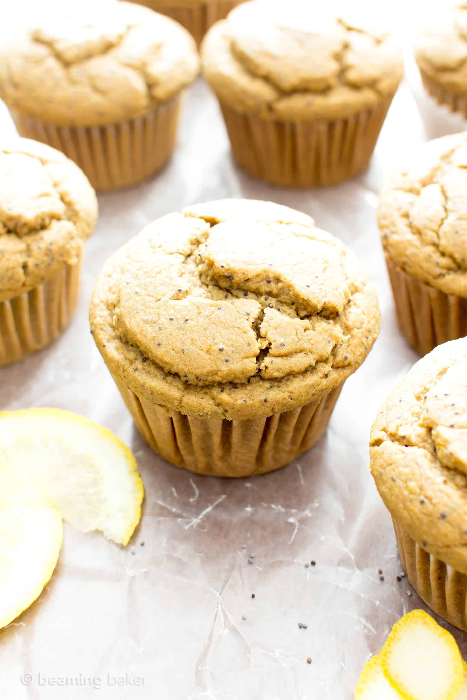 Vegan Lemon Poppy Seed Muffins (Gluten Free): an easy recipe for moist ‘n fluffy vegan lemon poppy seed muffins—perfectly sweet ‘n tart! Gluten Free. #Vegan #Lemon #PoppySeed #GlutenFree #Muffins | Recipe at BeamingBaker.com