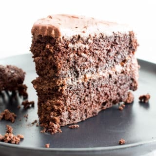 Vegan Chocolate Cake Recipe (V, GF): an easy recipe for supremely rich, perfectly moist chocolate cake covered in a delicious layer of irresistible chocolate frosting! #Vegan #GlutenFree #DairyFree #Chocolate #Cake #Dessert | Recipe on BeamingBaker.com