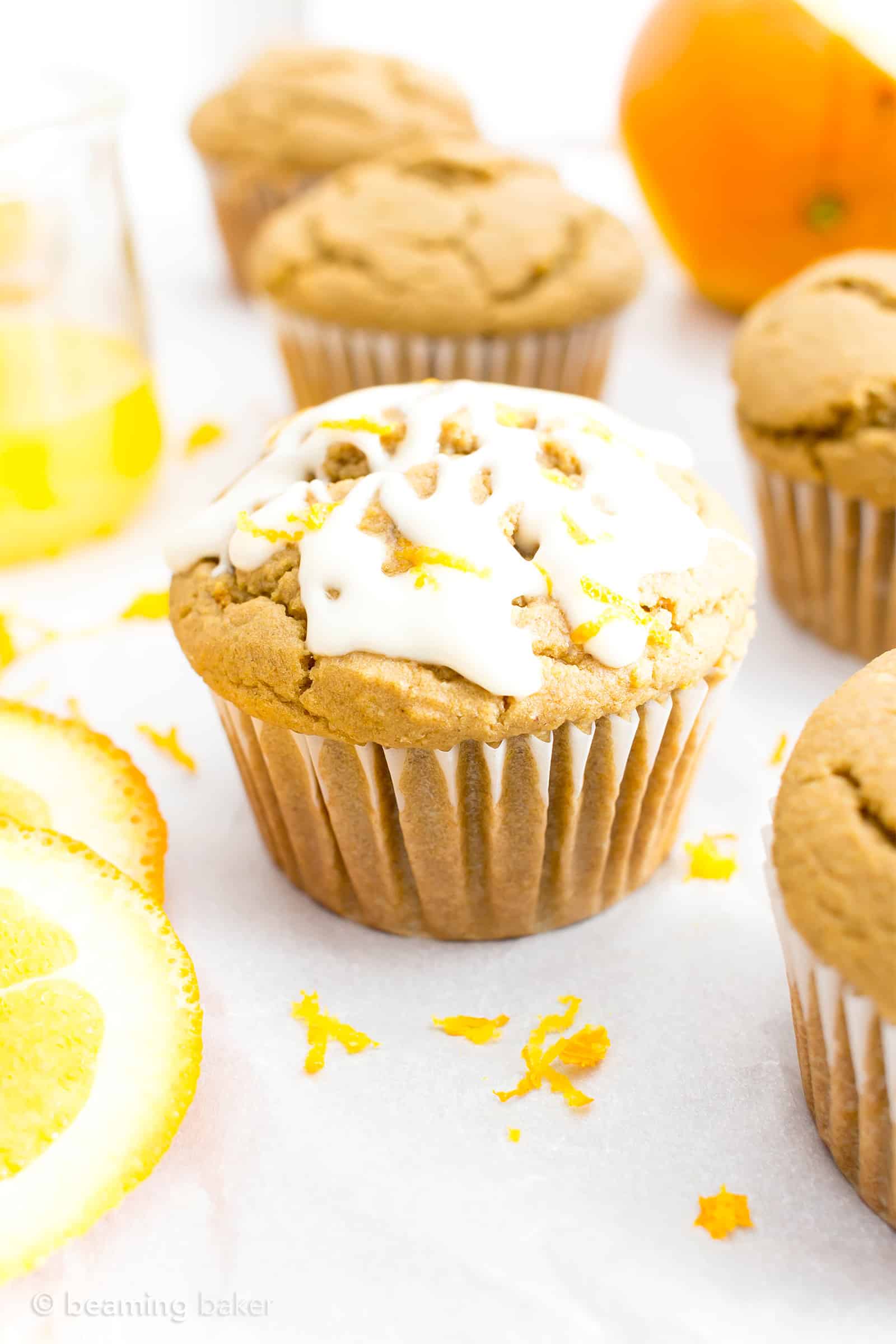 Easy Orange Muffins Recipe (V, GF): a fun recipe for perfectly moist homemade muffins bursting with zesty orange flavor! #Vegan #GlutenFree #DairyFree #Breakfast #Muffins | Recipe on BeamingBaker.com 