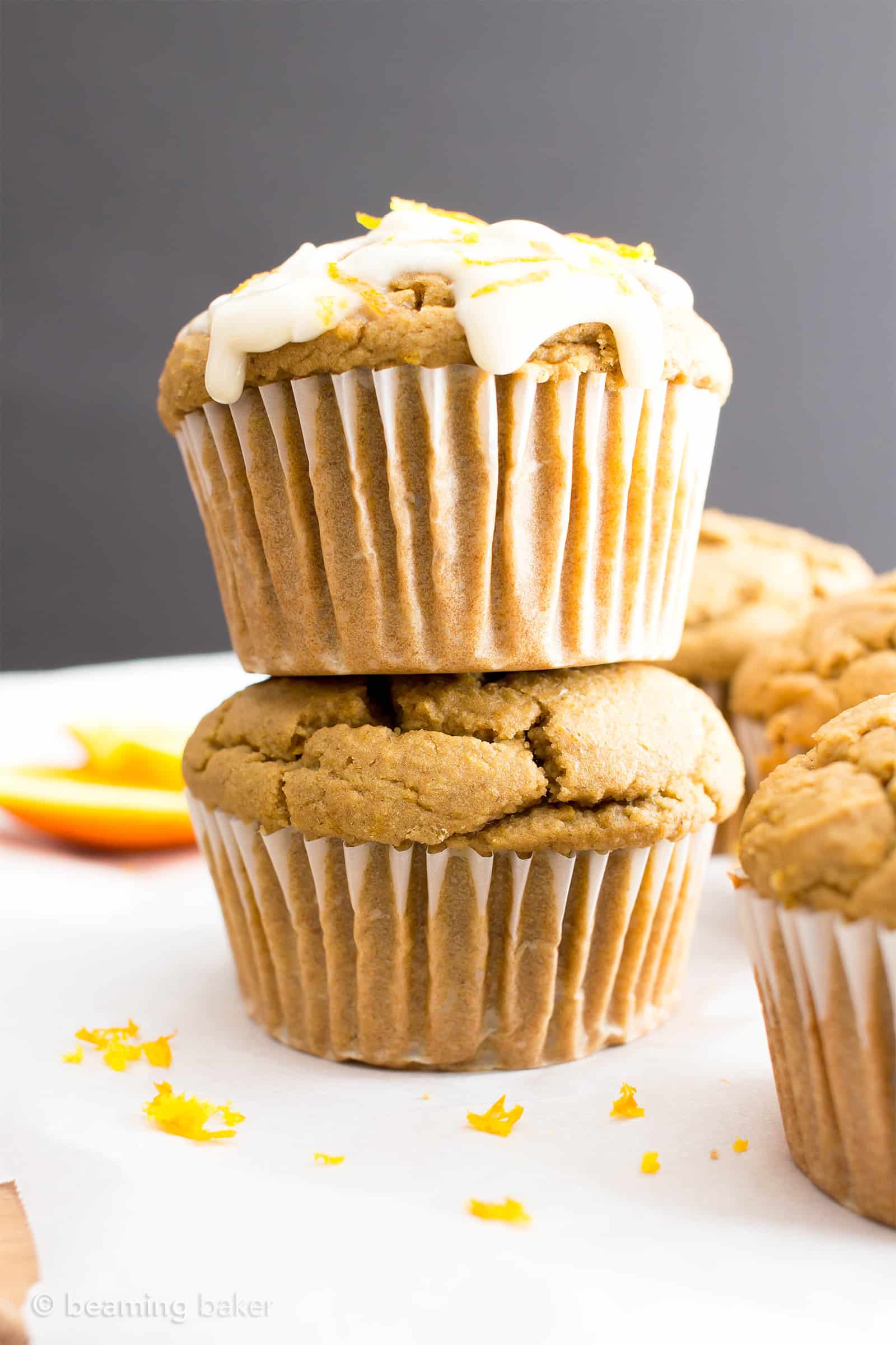 Easy Orange Muffins Recipe (V, GF): a fun recipe for perfectly moist homemade muffins bursting with zesty orange flavor! #Vegan #GlutenFree #DairyFree #Breakfast #Muffins | Recipe on BeamingBaker.com 