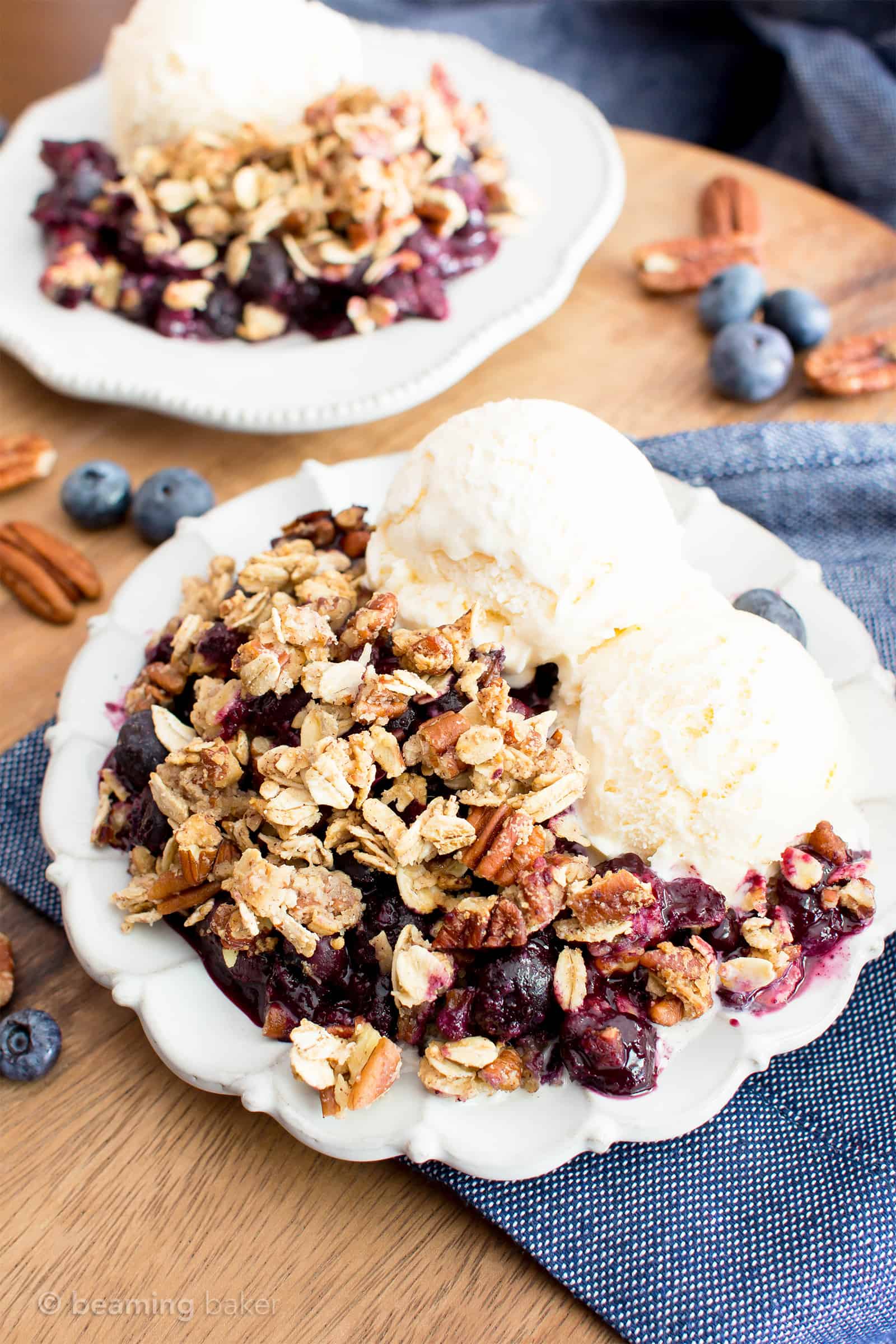 Vegan Gluten Free Blueberry Crisp (V+GF): an easy recipe for delightfully sweet ‘n crisp topping & warm, gooey blueberry filling to make for the perfect healthy summer dessert! #Vegan #GlutenFree #Paleo option #DairyFree #RefinedSugarFree #SummerDesserts #HealthyDesserts | Recipe at BeamingBaker.com