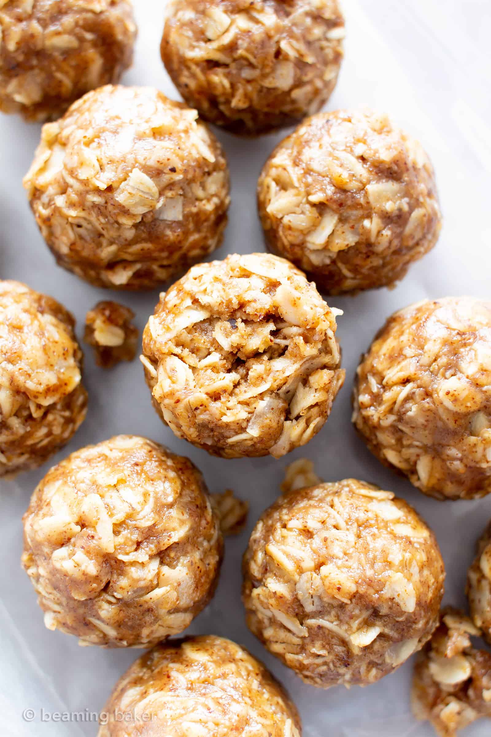 4 Ingredient No Bake Almond Butter Coconut Energy Bites (V, GF): an easy ‘n healthy recipe for deliciously chewy protein-rich energy bites made with nutrient-rich almond butter and coconut! #GlutenFree, #Vegan #DairyFree #OneBowl #HealthySnacks #AlmondButter #NoBake #NoBakeBites #ProteinPacked #Snacks | Recipe on BeamingBaker.com