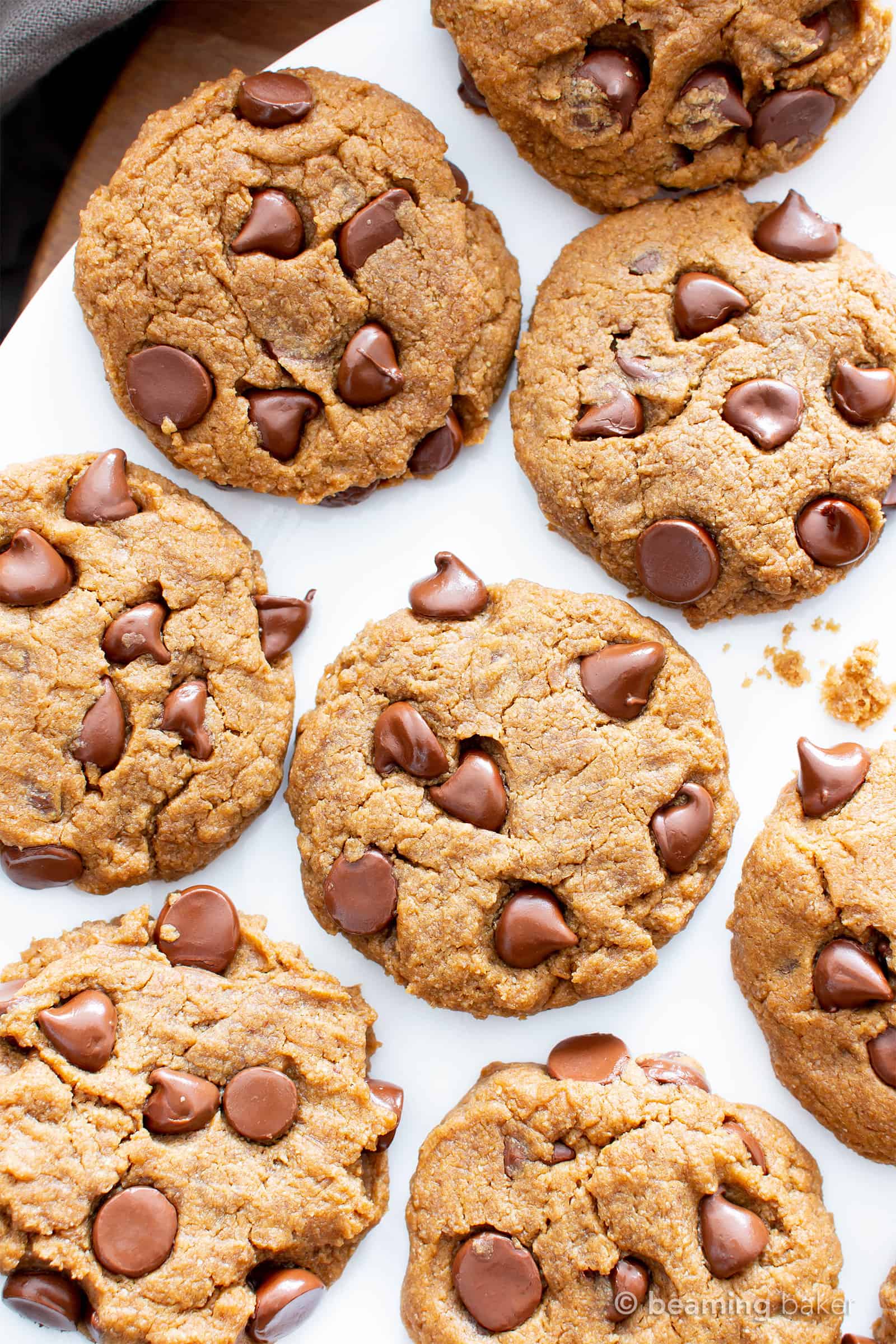 Gluten Free Peanut Butter Chocolate Chip Cookies (V, GF): an easy recipe for perfectly soft ‘n chewy chocolate chip cookies packed with peanut butter flavor! #Vegan #GlutenFree #DairyFree #PeanutButter #Cookies #Dessert #ChocolateChip | Recipe on BeamingBaker.com