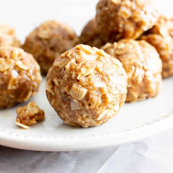 4 Ingredient No Bake Almond Butter Coconut Energy Bites (V, GF): an easy ‘n healthy recipe for deliciously chewy protein-rich energy bites made with nutrient-rich almond butter and coconut! #GlutenFree, #Vegan #DairyFree #OneBowl #HealthySnacks #AlmondButter #NoBake #NoBakeBites #ProteinPacked #Snacks | Recipe on BeamingBaker.com