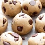 Oat flour cookie dough balls on parchment paper