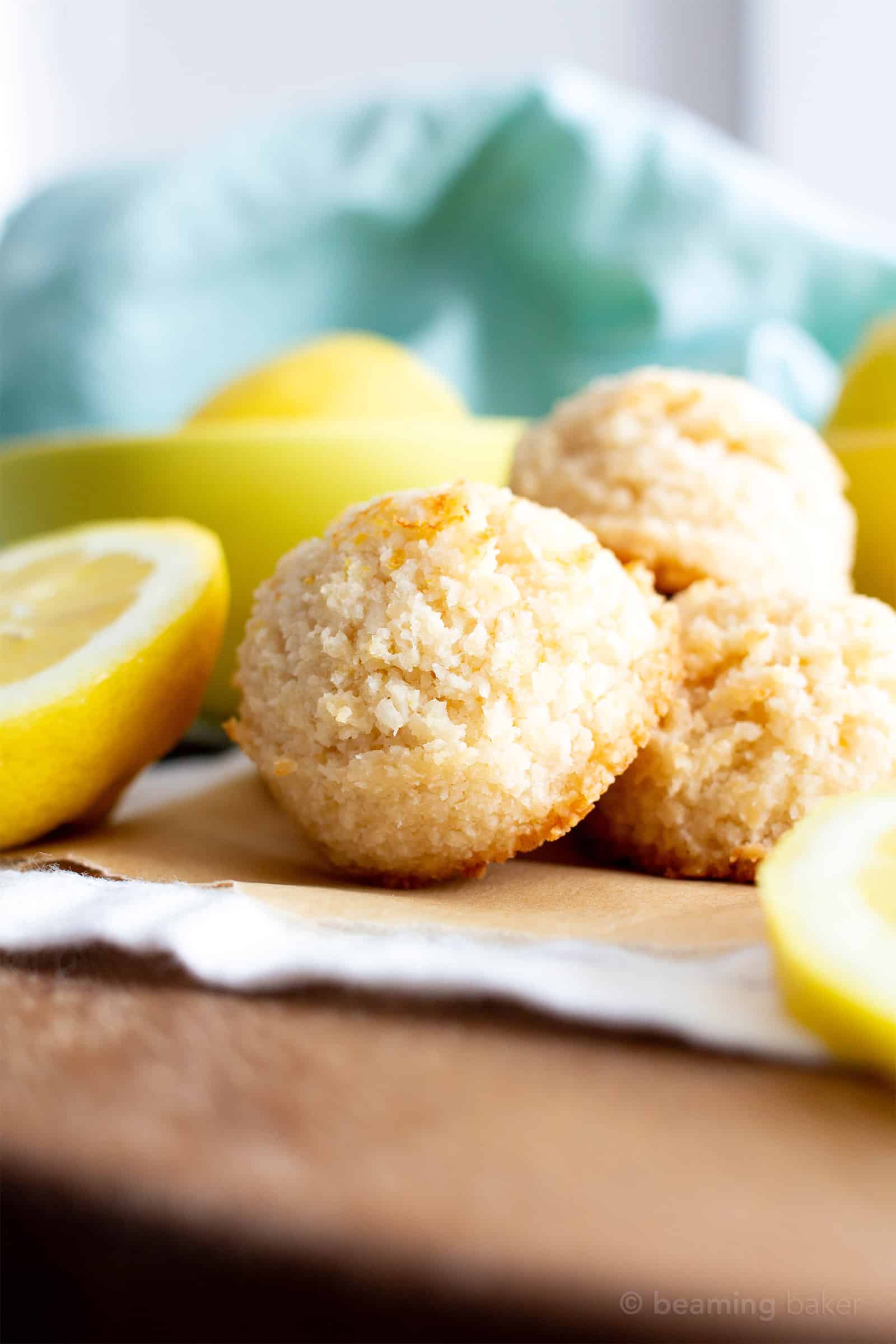 Lemon Coconut Macaroons Recipe (V, GF): an easy vegan recipe for sweetly tart lemon macaroons made from healthy ingredients to brighten your day! #Vegan #Paleo #Macaroons #Coconut #GlutenFree, #DairyFree #RefinedSugarFree #Dessert #HealthyDessert #Lemon #LemonDesserts #VeganDesserts | Recipe at BeamingBaker.com
