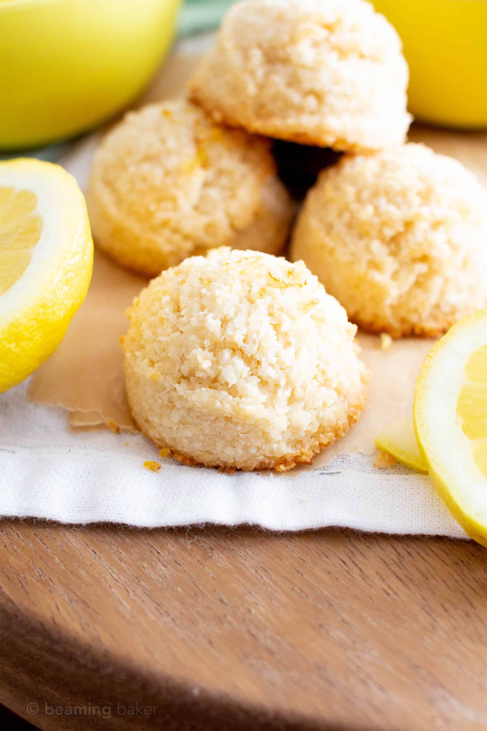 Lemon Coconut Macaroons Recipe (V, GF): an easy vegan recipe for sweetly tart lemon macaroons made from healthy ingredients to brighten your day! #Vegan #Paleo #Macaroons #Coconut #GlutenFree, #DairyFree #RefinedSugarFree #Dessert #HealthyDessert #Lemon #LemonDesserts #VeganDesserts | Recipe at BeamingBaker.com