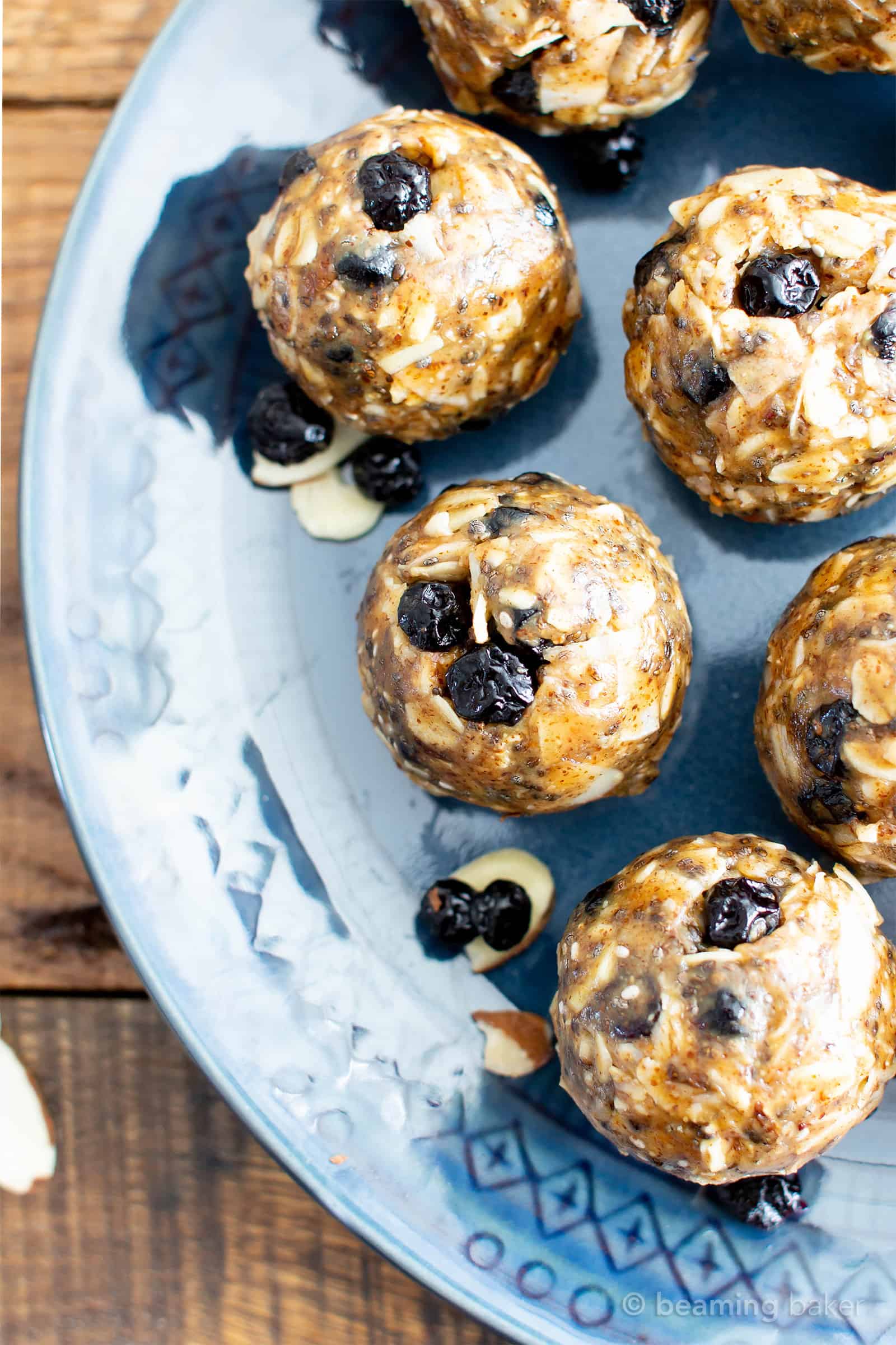 No Bake Blueberry Almond Chia Energy Bites (V, GF): a quick ‘n easy snack recipe for protein-rich no bake bites made with your favorite healthy ingredients! #Vegan #GlutenFree #ProteinRich #HealthySnacks #NoBake #Blueberries | Recipe at BeamingBaker.com