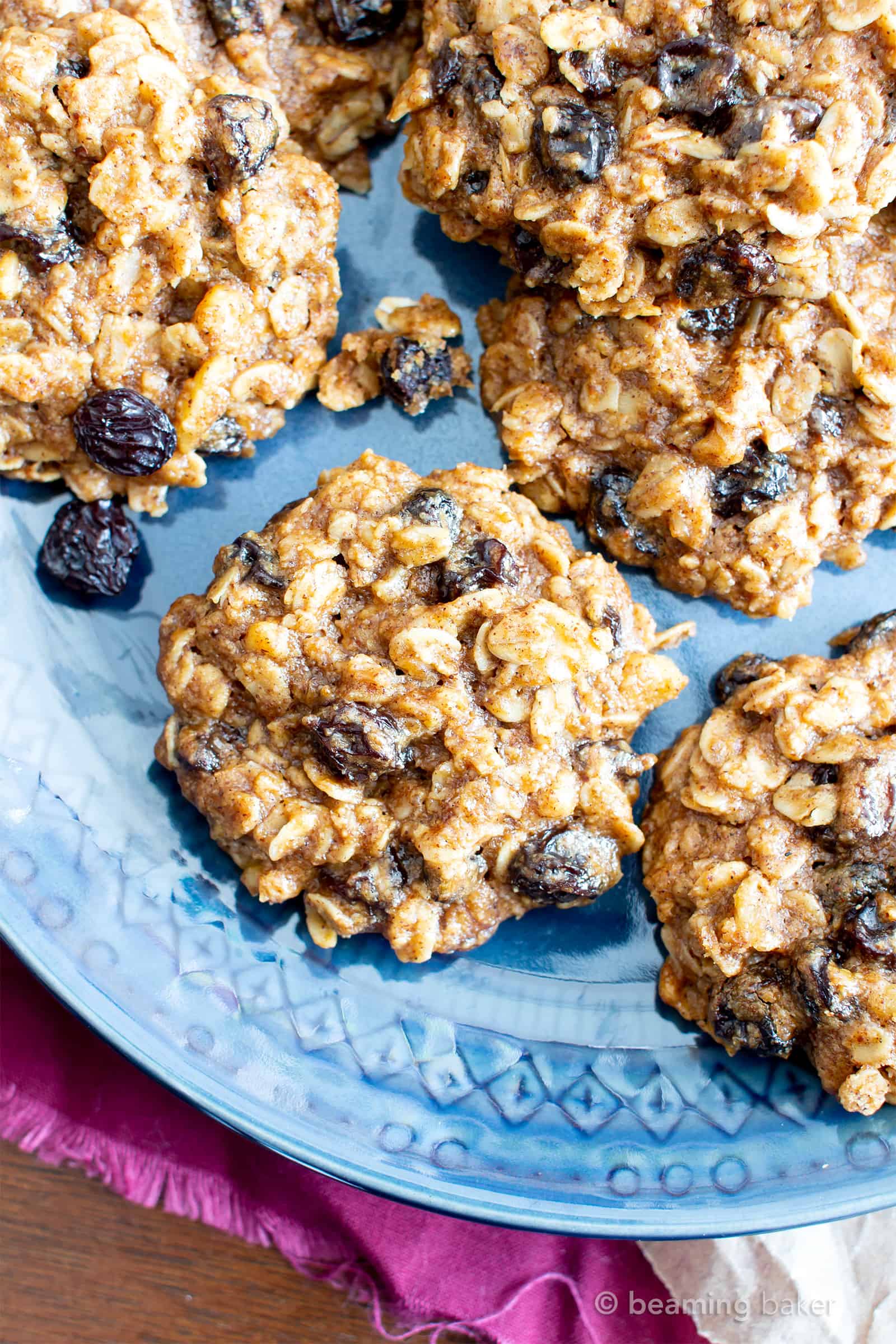 Chewy Oatmeal Raisin Cookie Recipe (V, GF): my favorite easy recipe for moist and chewy oatmeal cookies bursting with plump raisins and amazing flavor! #Vegan #GlutenFree #OatmealRaisin #Cookies #DairyFree #Healthy #HealthyCookies | Recipe at BeamingBaker.com