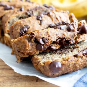 Best Moist Chocolate Chip Banana Bread Recipe (V, GF): a one bowl recipe for deliciously moist banana bread bursting with chocolate and made with healthy, whole ingredients. #Vegan #GlutenFree #DairyFree #Healthy #QuickBreads | Recipe at BeamingBaker.com