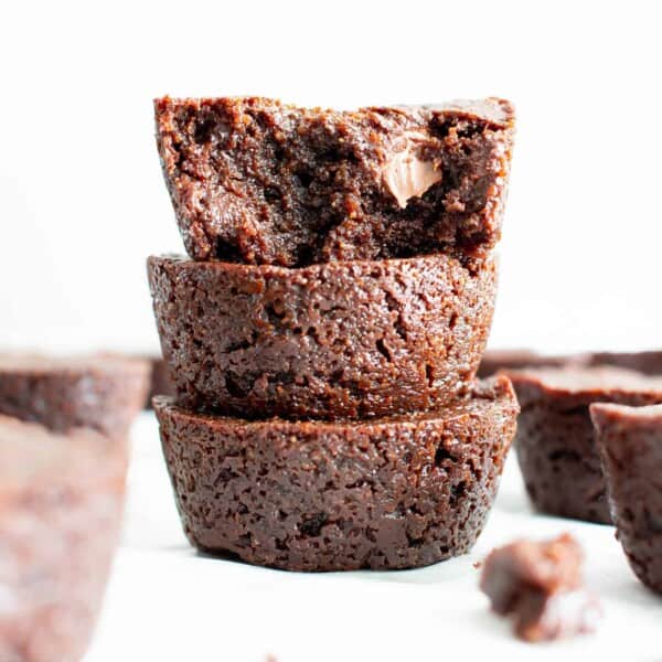 Mini Vegan Brownie Bites Recipe (V, GF): an easy recipe for soft, fudgy ‘n moist two bite mini brownies bursting with rich, chocolate flavor. Made with healthy, whole ingredients. #Vegan #GlutenFree #DairyFree #Brownies #VeganBaking #Chocolate | Recipe at BeamingBaker.com