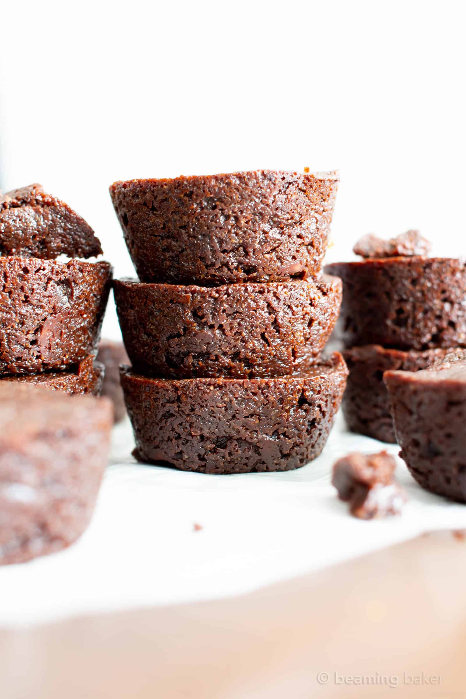 Mini Vegan Brownie Bites Recipe (V, GF): an easy recipe for soft, fudgy ‘n moist two bite mini brownies bursting with rich, chocolate flavor. Made with healthy, whole ingredients. #Vegan #GlutenFree #DairyFree #Brownies #VeganBaking #Chocolate | Recipe at BeamingBaker.com