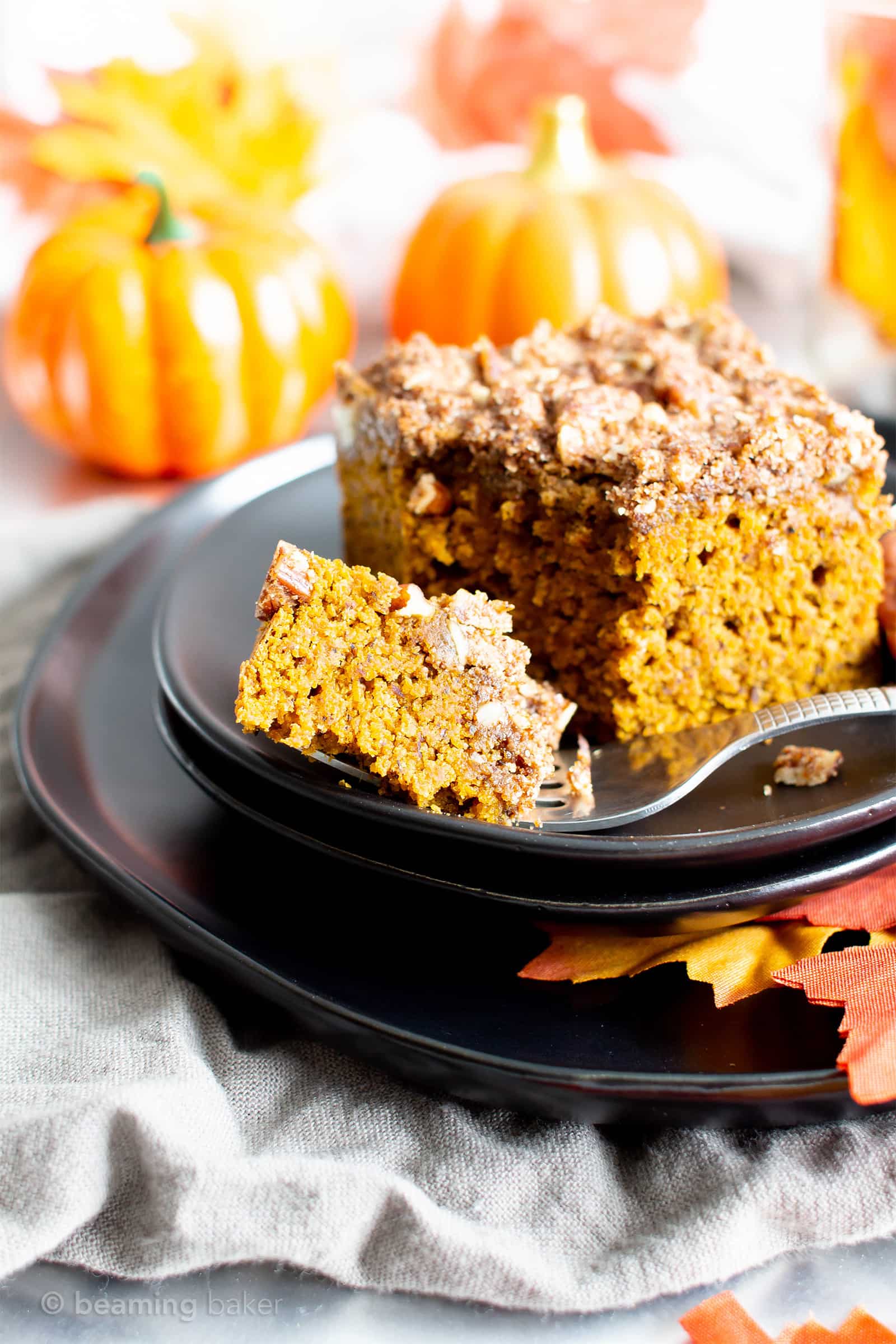 Easy Gluten Free Vegan Pumpkin Coffee Cake Recipe (V, GF): a thick layer of moist pumpkin coffee cake with a cinnamon sweet, buttery-rich topping. Made with healthy, whole ingredients. #Vegan #GlutenFree #CoffeeCake #Pumpkin #VeganBaking #CleanEating #Fall #PumpkinSpice | Recipe at BeamingBaker.com