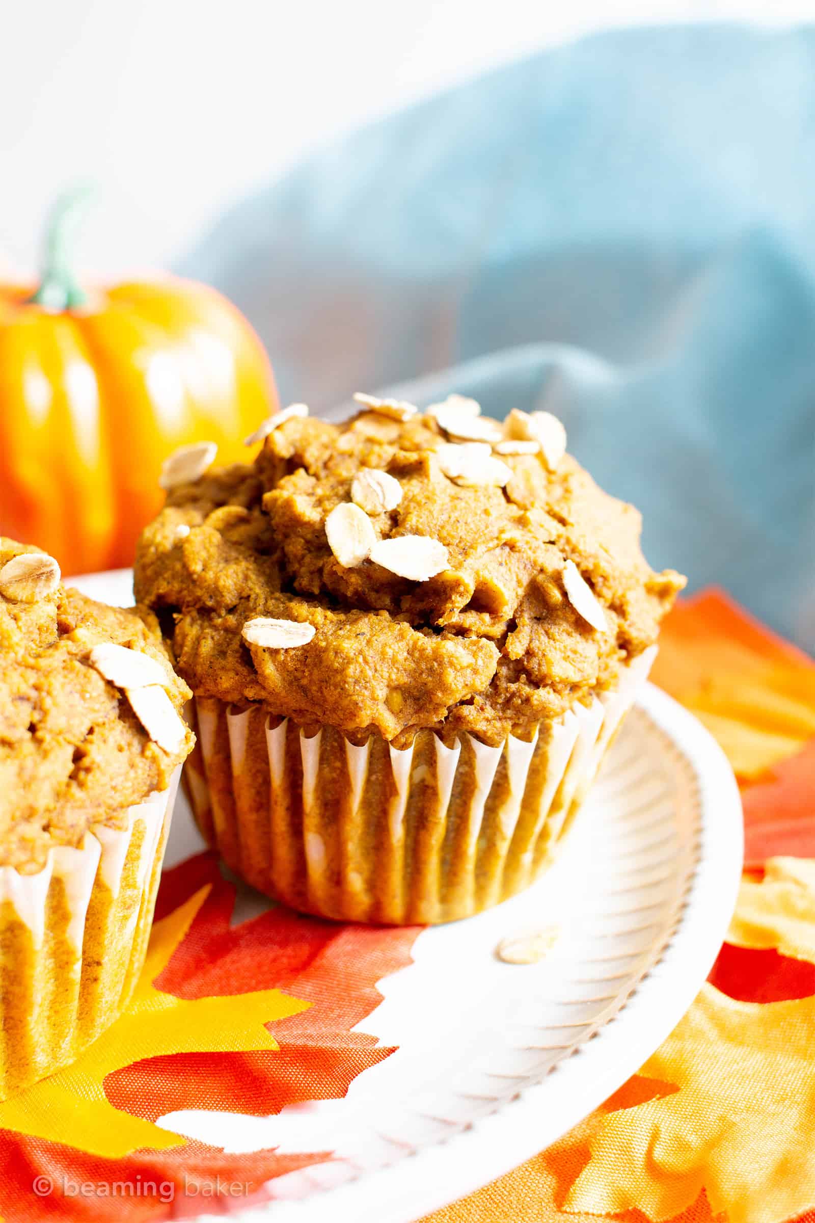 This Healthy Pumpkin Oatmeal Muffins recipe yields lightly sweet, moist pumpkin oatmeal muffins made with vegan + gluten free ingredients. #Pumpkin #Oatmeal #Muffins | Recipe at BeamingBaker.com