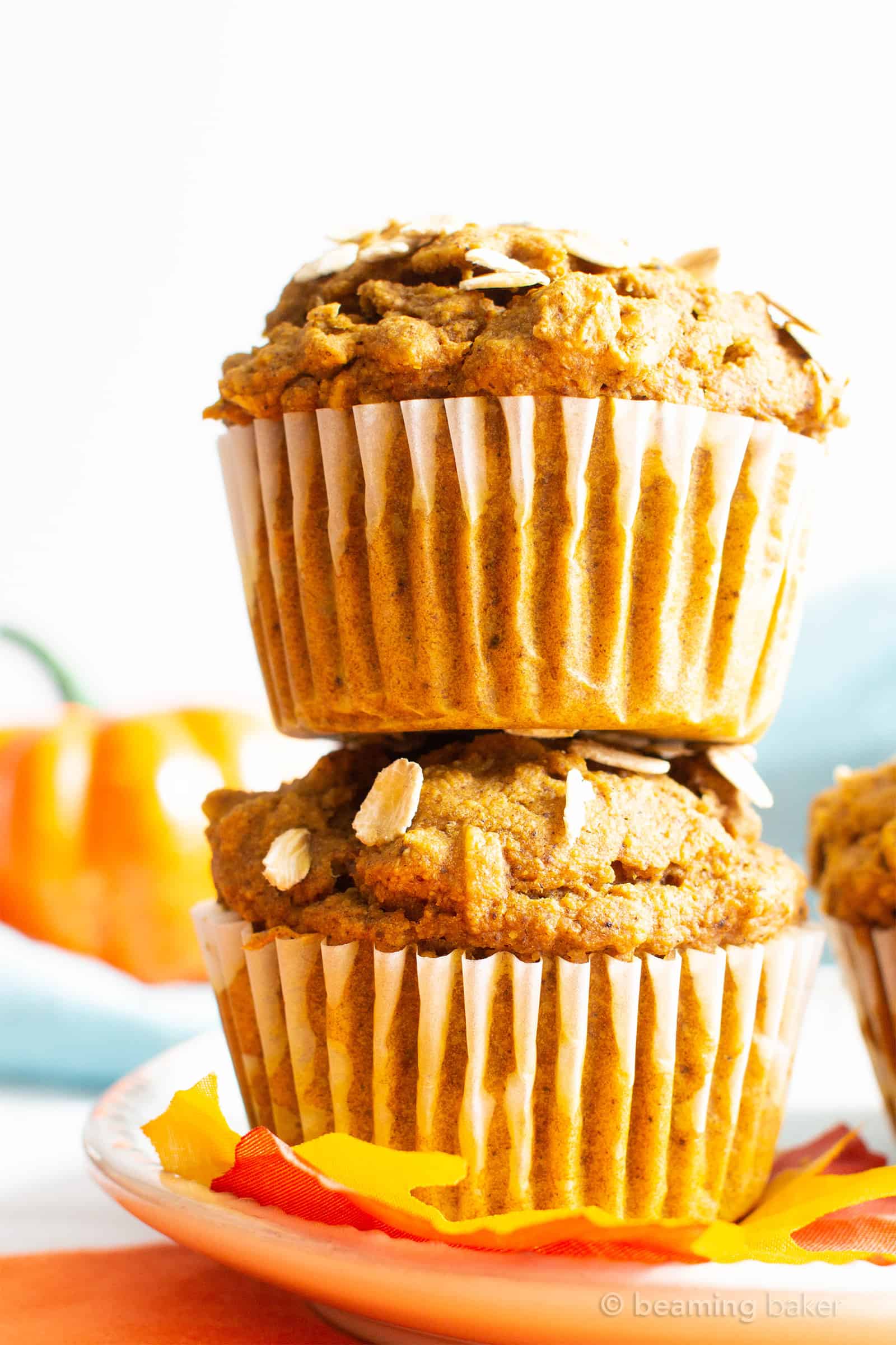 This Healthy Pumpkin Oatmeal Muffins recipe yields lightly sweet, moist pumpkin oatmeal muffins made with vegan + gluten free ingredients. #Pumpkin #Oatmeal #Muffins | Recipe at BeamingBaker.com
