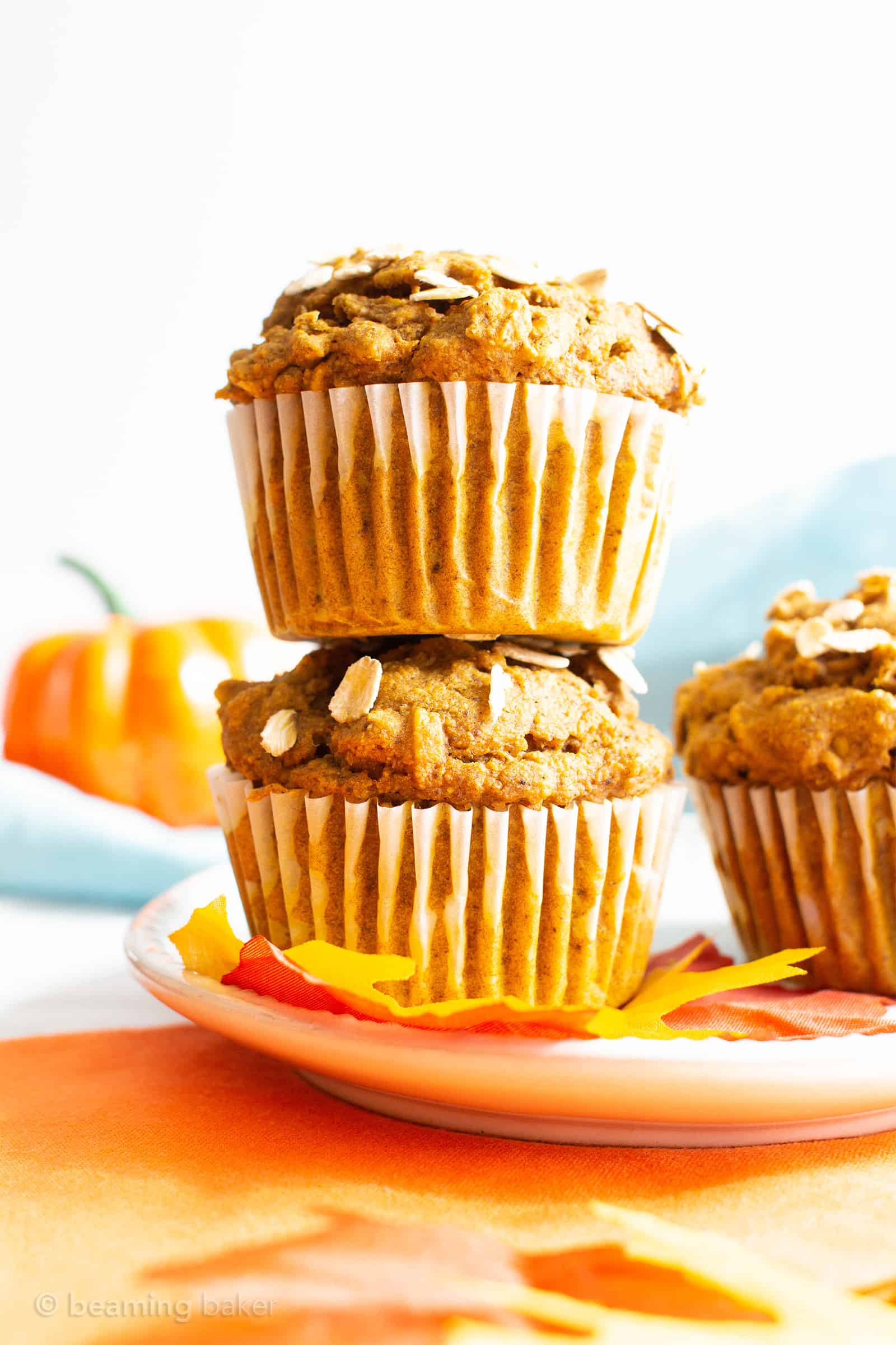 This Healthy Pumpkin Oatmeal Muffins recipe yields lightly sweet, moist pumpkin oatmeal muffins made with vegan + gluten free ingredients. #Pumpkin #Oatmeal #Muffins | Recipe at BeamingBaker.com