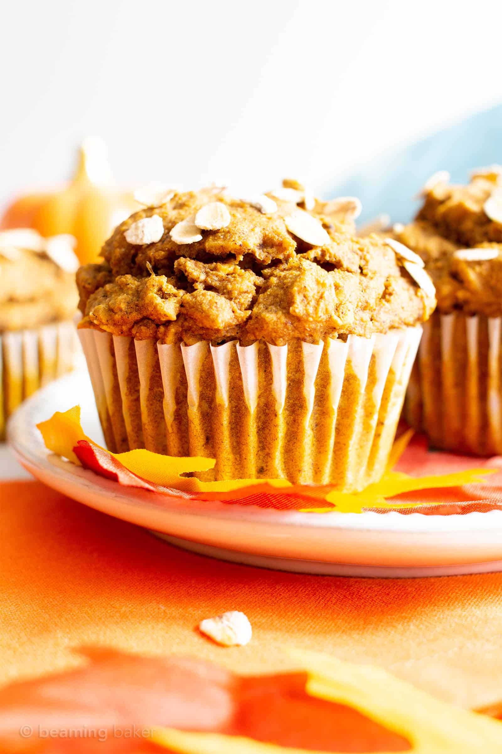 This Healthy Pumpkin Oatmeal Muffins recipe yields lightly sweet, moist pumpkin oatmeal muffins made with vegan + gluten free ingredients. #Pumpkin #Oatmeal #Muffins | Recipe at BeamingBaker.com