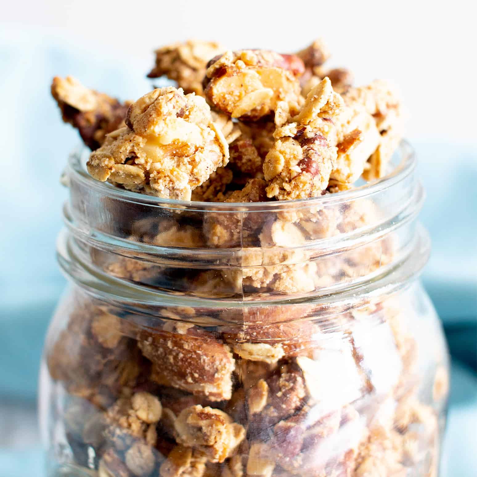 4 Ingredient Healthy Homemade Gluten Free Vegan Granola Recipe (V, GF): a crispy homemade granola recipe made in just a few minutes of prep time, packed full of your favorite nuts and oats. #Vegan #Granola #GlutenFree #Healthy #Snacks | Recipe at BeamingBaker.com