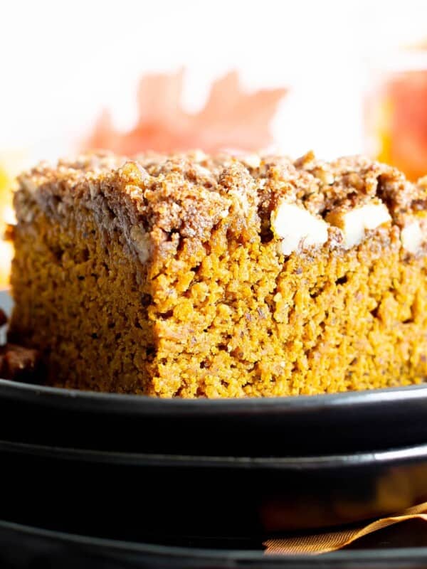 Easy Gluten Free Vegan Pumpkin Coffee Cake Recipe (V, GF): a thick layer of moist pumpkin coffee cake with a cinnamon sweet, buttery-rich topping. Made with healthy, whole ingredients. #Vegan #GlutenFree #CoffeeCake #Pumpkin #VeganBaking #CleanEating #Fall #PumpkinSpice | Recipe at BeamingBaker.com