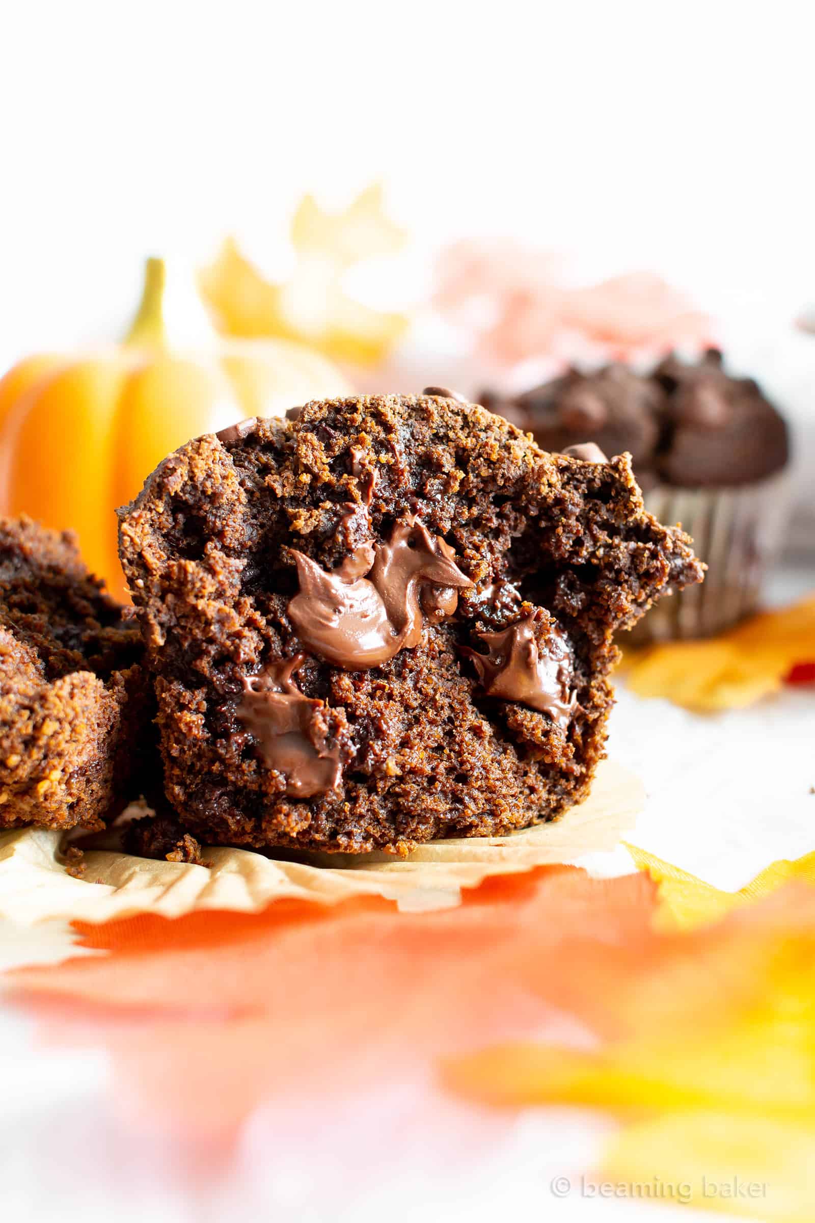 Easy Gluten Free Chocolate Pumpkin Muffins (V, GF): a one bowl recipe for moist, fudgy chocolate pumpkin muffins packed with rich fall flavors! Made with healthy, whole ingredients. #Vegan #GlutenFree #Muffins #Pumpkin #Fall #Chocolate #CleanEating | Recipe at BeamingBaker.com