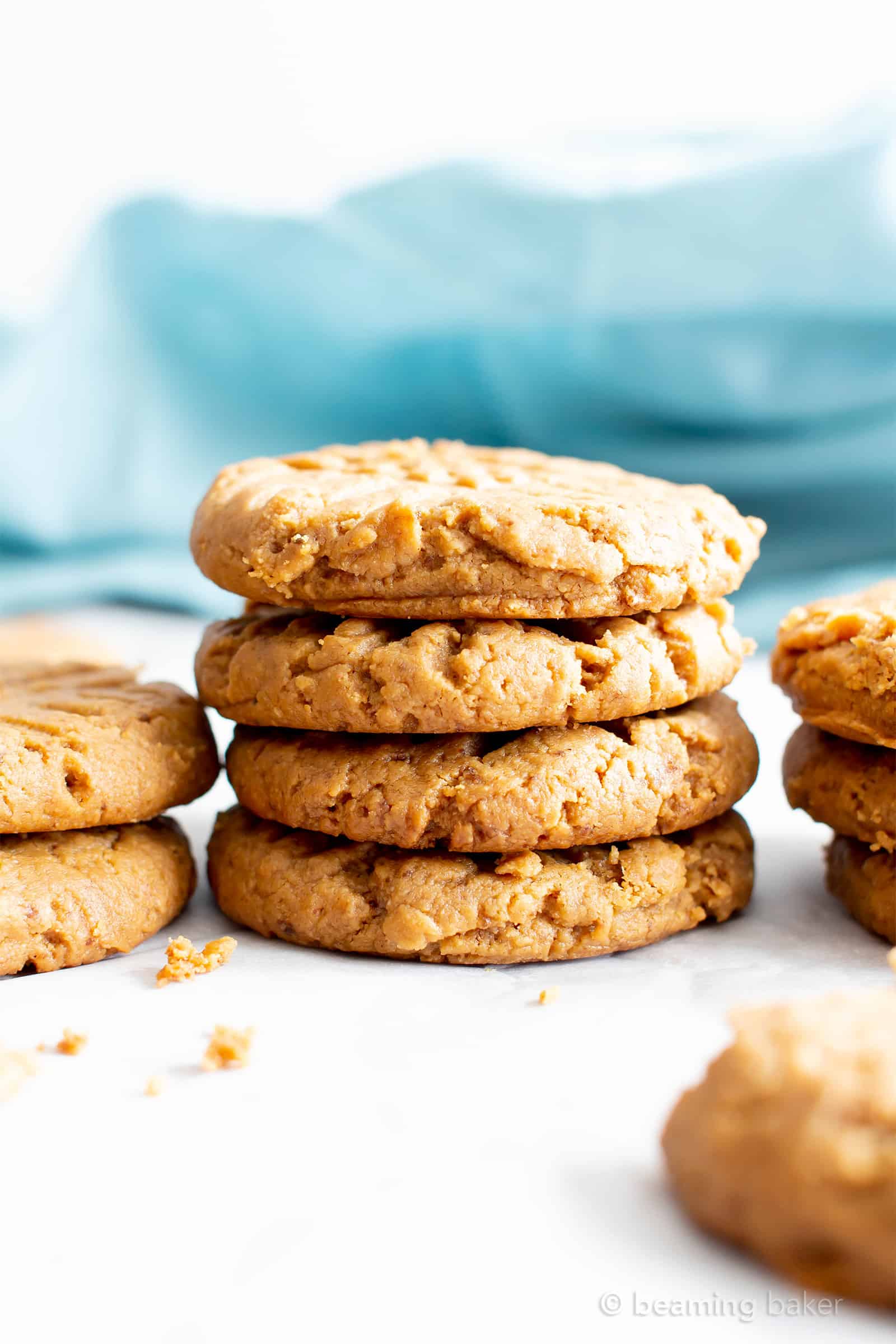 Soft Healthy Peanut Butter Cookies: this 4 ingredient Gluten Free peanut butter cookies recipe yields soft & healthy peanut butter cookies! The best GF peanut butter cookies—vegan, dairy-free and refined sugar free. Oil-Free, Grain Free. #PeanutButter #Cookies #GlutenFree #Healthy | Recipe at BeamingBaker.com