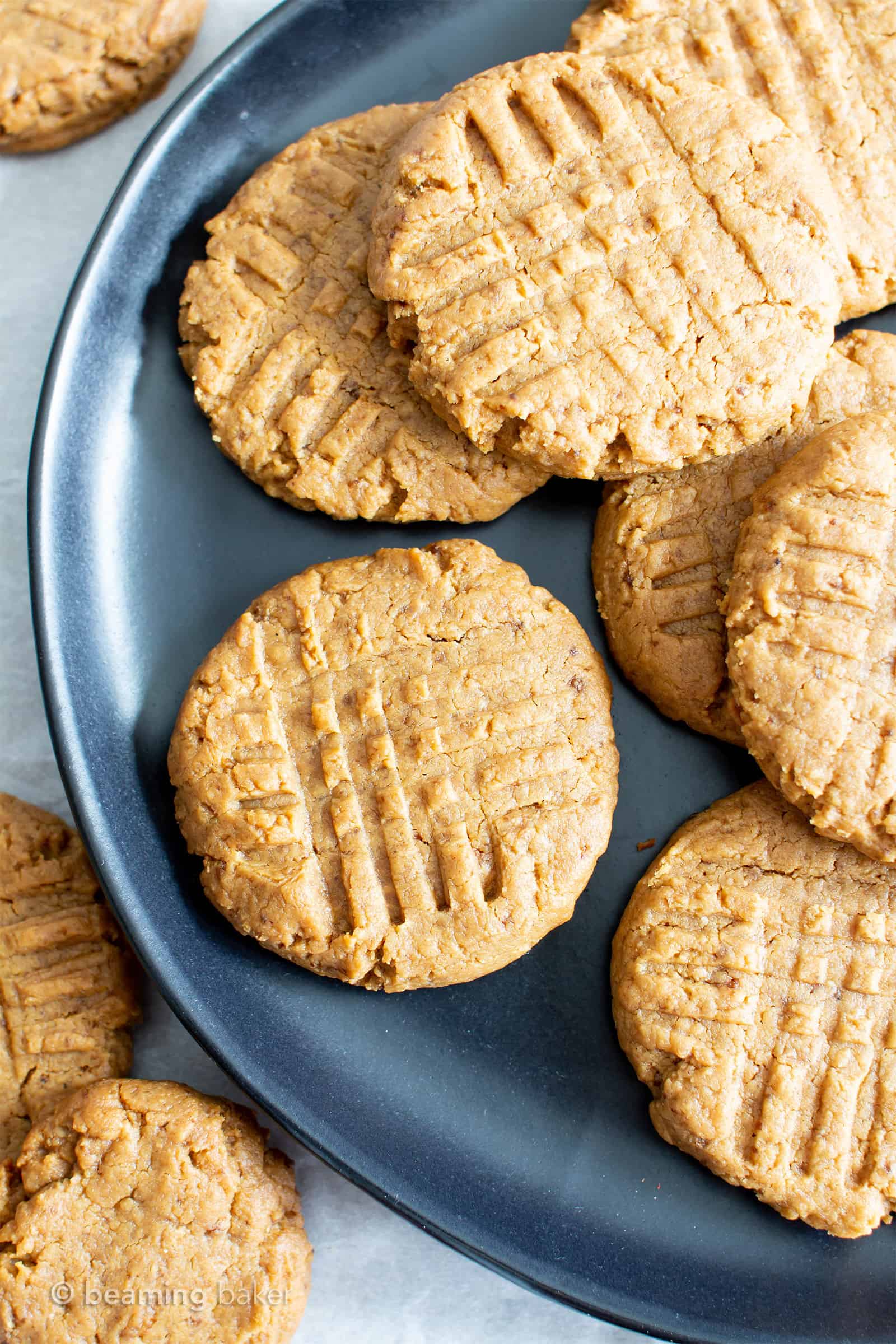 Soft Healthy Peanut Butter Cookies: this 4 ingredient Gluten Free peanut butter cookies recipe yields soft & healthy peanut butter cookies! The best GF peanut butter cookies—vegan, dairy-free and refined sugar free. Oil-Free, Grain Free. #PeanutButter #Cookies #GlutenFree #Healthy | Recipe at BeamingBaker.com