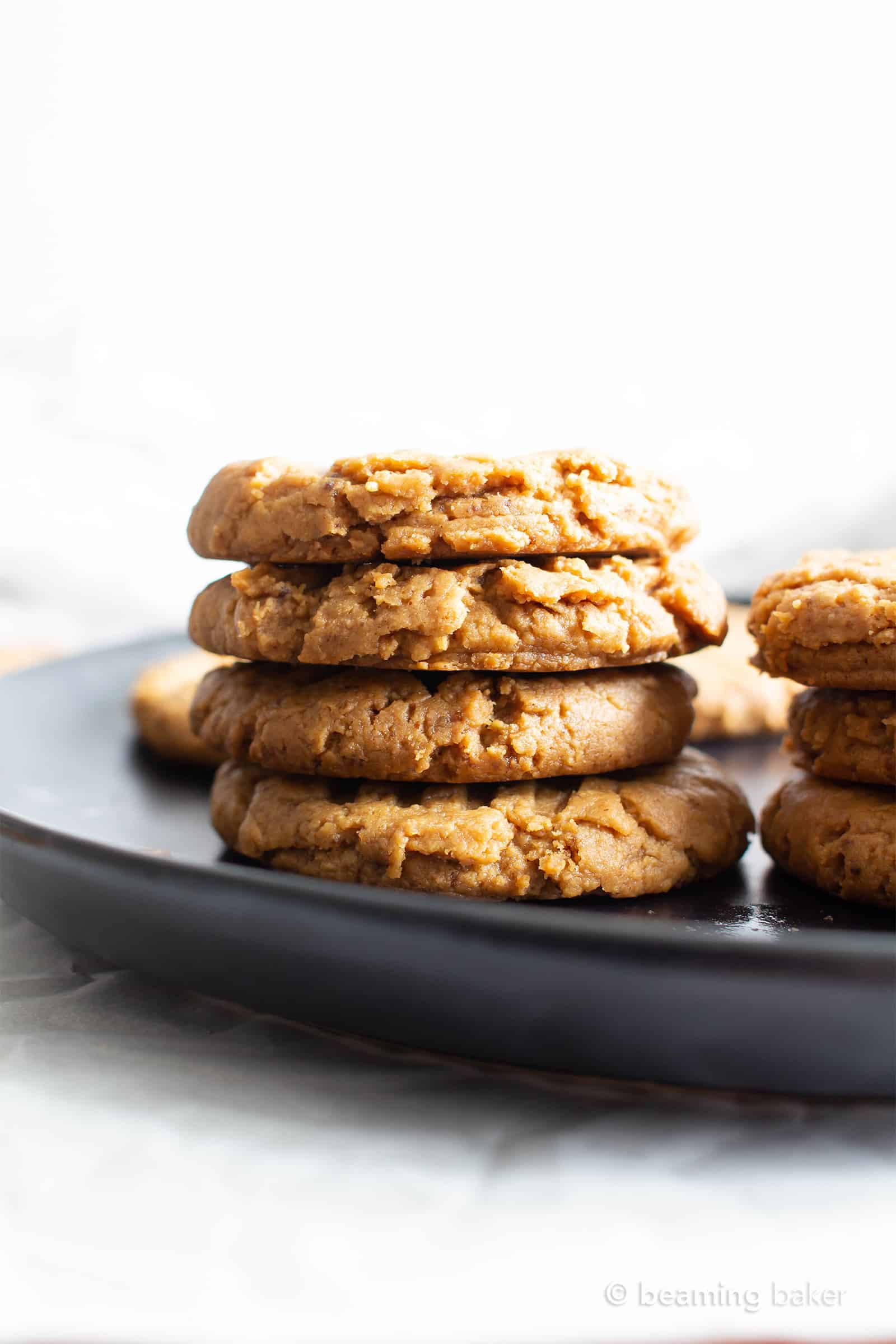 Soft Healthy Peanut Butter Cookies: this 4 ingredient Gluten Free peanut butter cookies recipe yields soft & healthy peanut butter cookies! The best GF peanut butter cookies—vegan, dairy-free and refined sugar free. Oil-Free, Grain Free. #PeanutButter #Cookies #GlutenFree #Healthy | Recipe at BeamingBaker.com