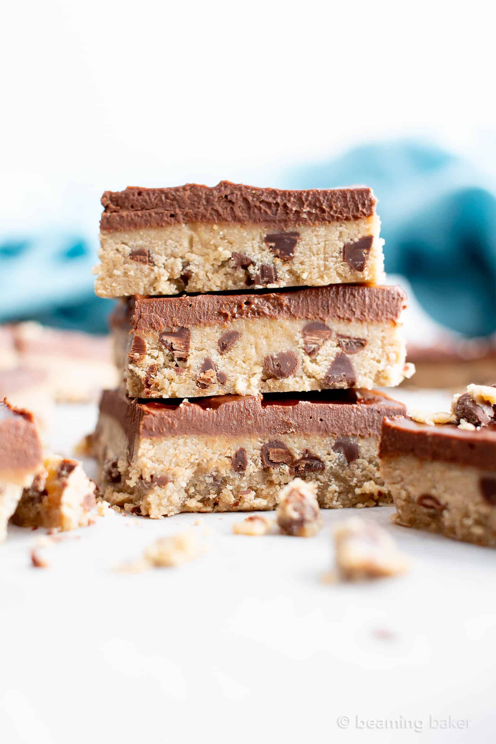 Healthy Gluten Free Cookie Dough Bars (V, GF): an easy, no bake recipe for decadent edible cookie dough bars coated in a thick layer of mouthwatering chocolate topping. Made with healthy, whole ingredients. #Vegan #GlutenFree #CookieDough #HealthyDesserts #NoBake #GlutenFreeVegan #BeamingBaker | Recipe at BeamingBaker.com