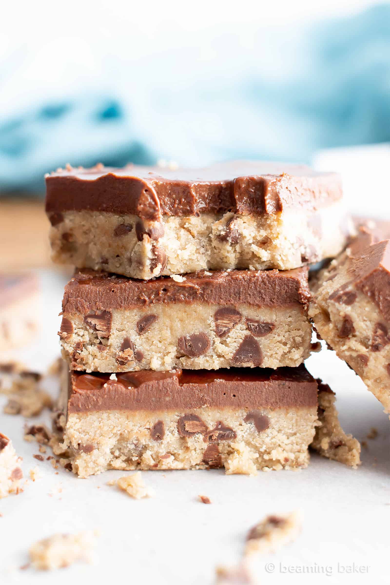 Healthy Gluten Free Cookie Dough Bars (V, GF): an easy, no bake recipe for decadent edible cookie dough bars coated in a thick layer of mouthwatering chocolate topping. Made with healthy, whole ingredients. #Vegan #GlutenFree #CookieDough #HealthyDesserts #NoBake #GlutenFreeVegan #BeamingBaker | Recipe at BeamingBaker.com