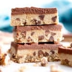 Healthy Gluten Free Cookie Dough Bars (V, GF): an easy, no bake recipe for decadent edible cookie dough bars coated in a thick layer of mouthwatering chocolate topping. Made with healthy, whole ingredients. #Vegan #GlutenFree #CookieDough #HealthyDesserts #NoBake #GlutenFreeVegan #BeamingBaker | Recipe at BeamingBaker.com