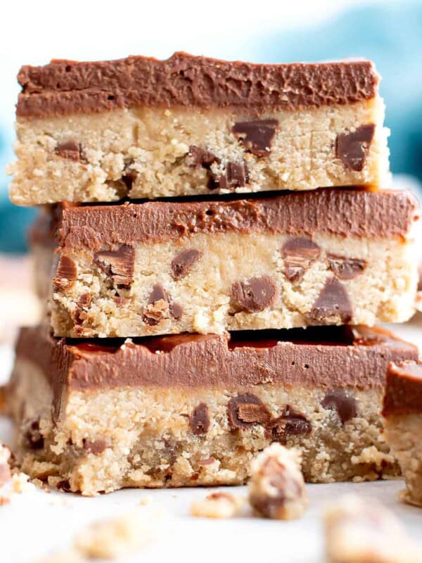 Healthy Gluten Free Cookie Dough Bars (V, GF): an easy, no bake recipe for decadent edible cookie dough bars coated in a thick layer of mouthwatering chocolate topping. Made with healthy, whole ingredients. #Vegan #GlutenFree #CookieDough #HealthyDesserts #NoBake #GlutenFreeVegan #BeamingBaker | Recipe at BeamingBaker.com