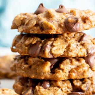 Chewy Healthy Oatmeal Chocolate Chip Cookies (V, GF): my favorite easy recipe for chewy oatmeal chocolate chip cookies with mouthwatering crispy edges, bursting with chocolate morsels! Made with healthy ingredients. #OatmealCookies #Vegan #GlutenFree #DairyFree #HealthyBaking #GlutenFreeVegan #BeamingBaker | Recipe at BeamingBaker.com