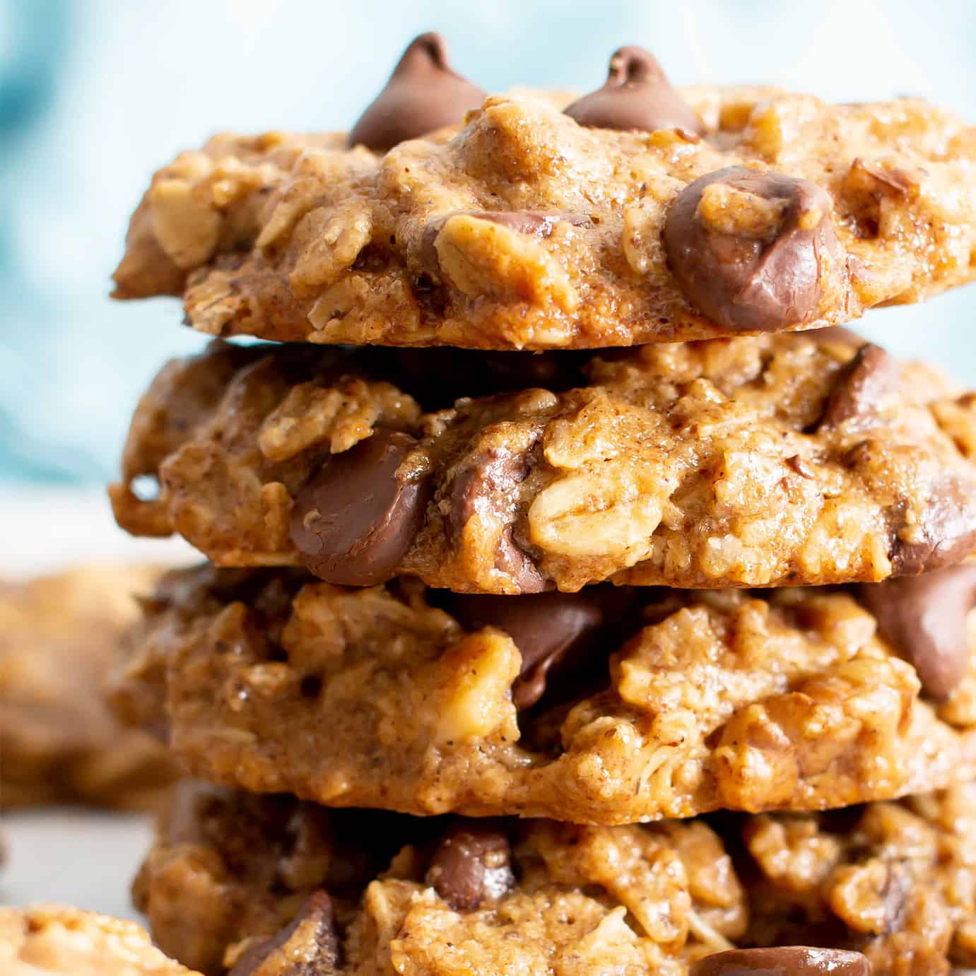 Easy Healthy Oatmeal Chocolate Chip Cookies: this easy healthy oatmeal chocolate chip cookies recipe yields chewy cookies with crispy edges and lots of chocolate chips! Vegan, Gluten-Free, Dairy-Free, Healthy. #Healthy #OatmealCookies #HealthyCookies #ChocolateChip | Recipe at BeamingBaker.com