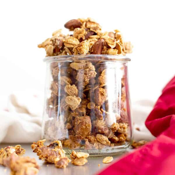 Gluten Free Chai Spice Granola Recipe (V, GF): a super easy, 1-bowl recipe for crunchy granola bursting with your favorite fall spices and nuts! Made with healthy ingredients. #Vegan #BeamingBaker #GlutenFree #VeganGlutenFree #Granola #HomemadeGranola #ChaiSpice #HealthySnacks | Recipe at BeamingBaker.com