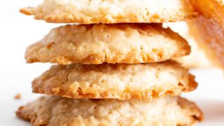 4 Ingredient Vegan Coconut Cookies: chewy, crispy healthy coconut cookies bursting with coconut flavor. The best gluten free coconut cookies—paleo ingredients, delicious! #Vegan #Cookies #Paleo #Healthy #Coconut | Recipe at BeamingBaker.com