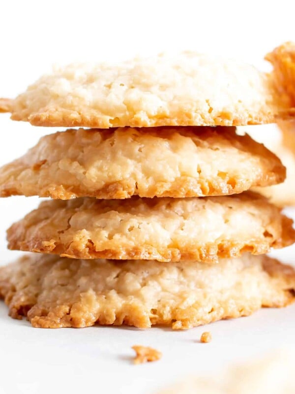 4 Ingredient Vegan Coconut Cookies: chewy, crispy healthy coconut cookies bursting with coconut flavor. The best gluten free coconut cookies—paleo ingredients, delicious! #Vegan #Cookies #Paleo #Healthy #Coconut | Recipe at BeamingBaker.com