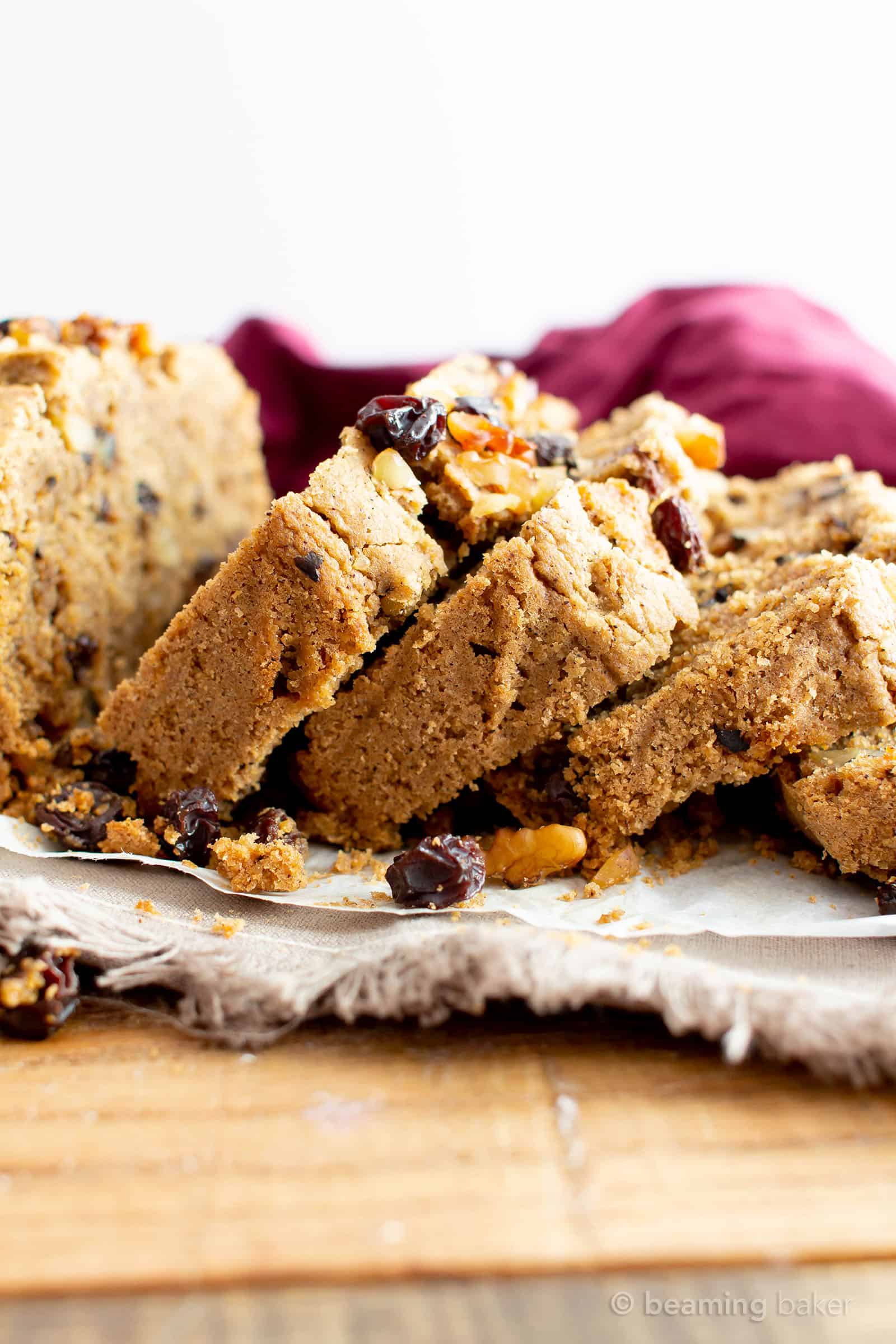 Vegan Cinnamon Raisin Quick Bread Recipe: rich, moist vegan quick bread bursting with juicy raisins under a blanket of warm cinnamon flavor. Gluten Free. Made with simple, whole ingredients. #Vegan #GlutenFree #Cinnamon #Raisin #Bread | Recipe at BeamingBaker.com