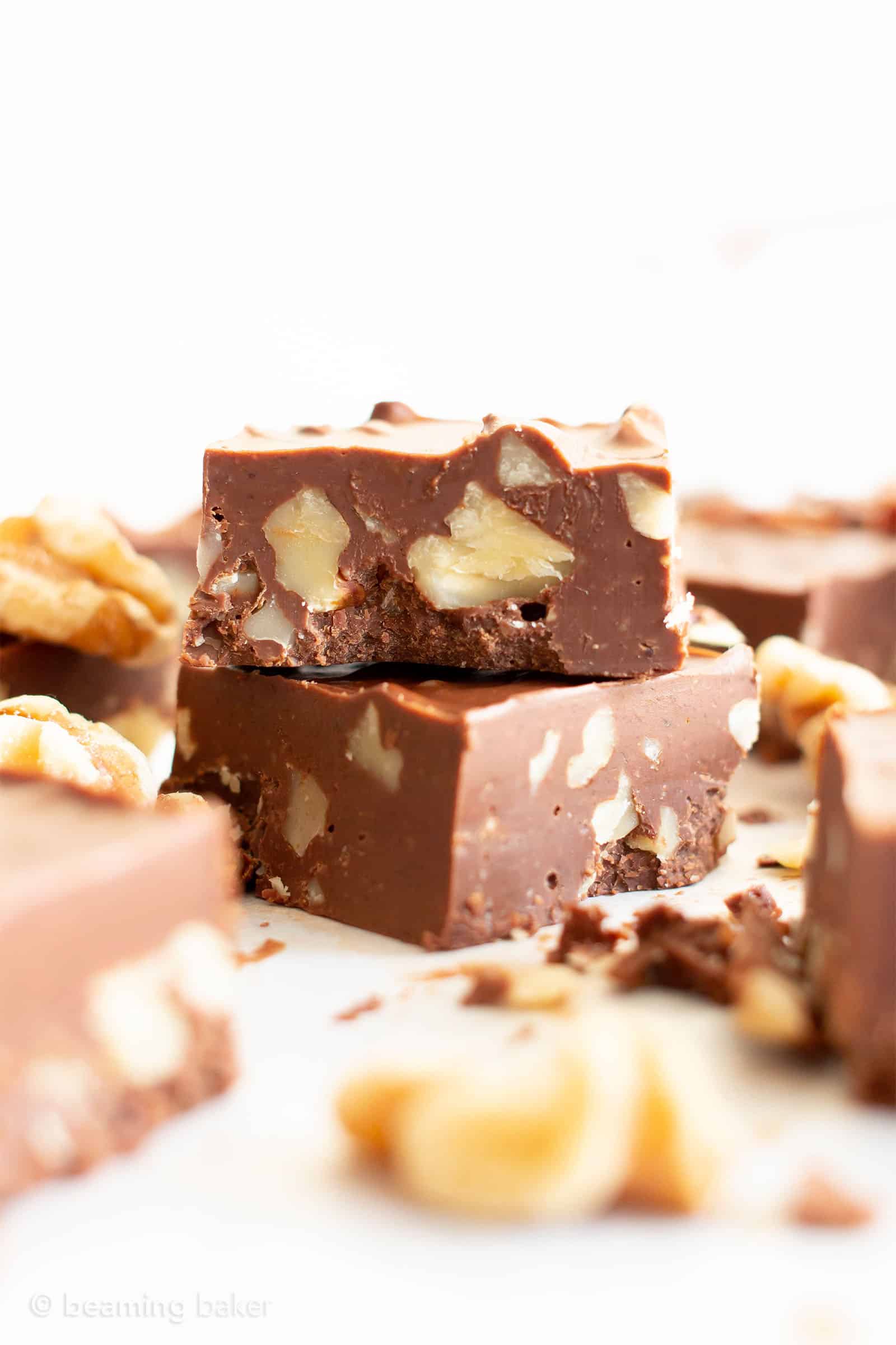 3 Ingredient Chocolate Walnut Fudge (V, GF): a 5-min recipe for thick squares of rich, velvety paleo vegan fudge packed with delicious walnuts. Made with healthy ingredients. #HealthyDesserts #Christmas #VeganGlutenFree #PaleoDesserts #VeganFudge #Fudge #BeamingBaker | Recipe at BeamingBaker.com
