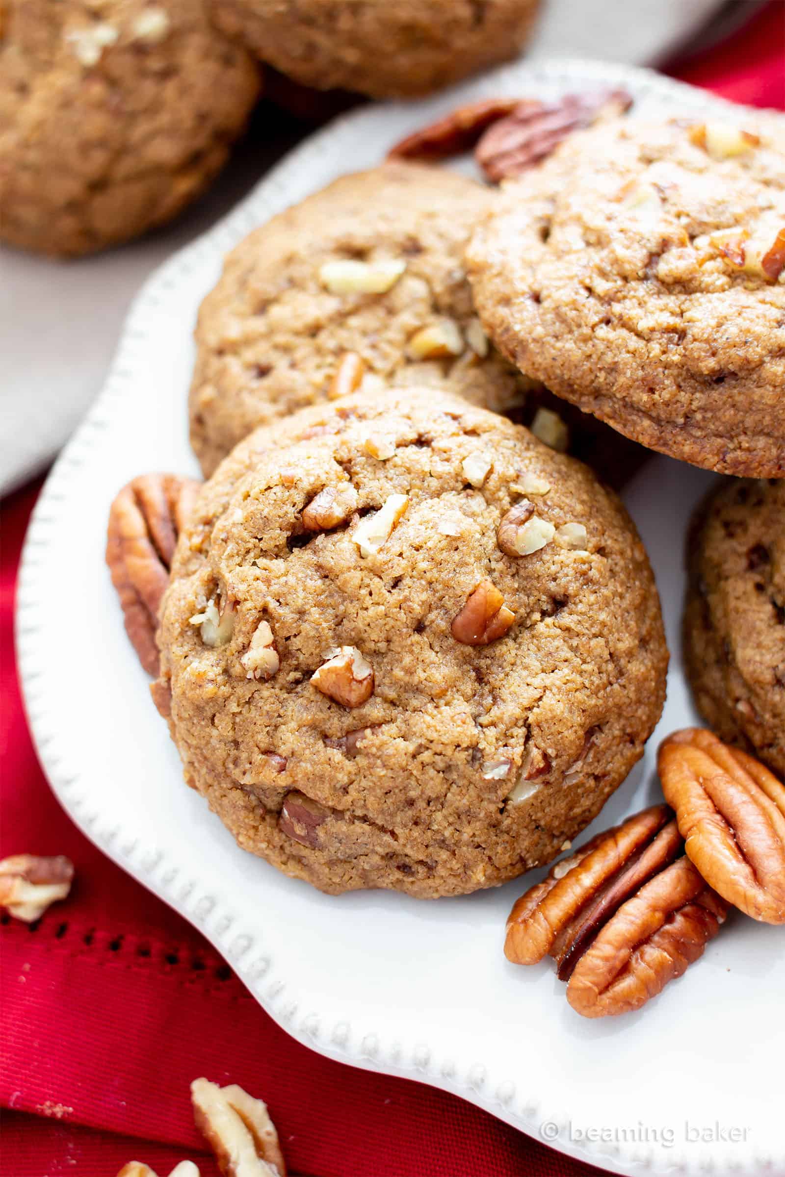Easy Vegan Cinnamon Pecan Cookies (V, GF): an easy recipe for chewy on the outside, soft on the inside buttery gluten free pecan cookies bursting with pecan crunch and a cinnamon kick! Made with healthy ingredients. #Cookies #BeamingBaker #Vegan #GlutenFree #GlutenFreeCookies #Christmas #HealthyBaking #VeganCookies | Recipe at BeamingBaker.com