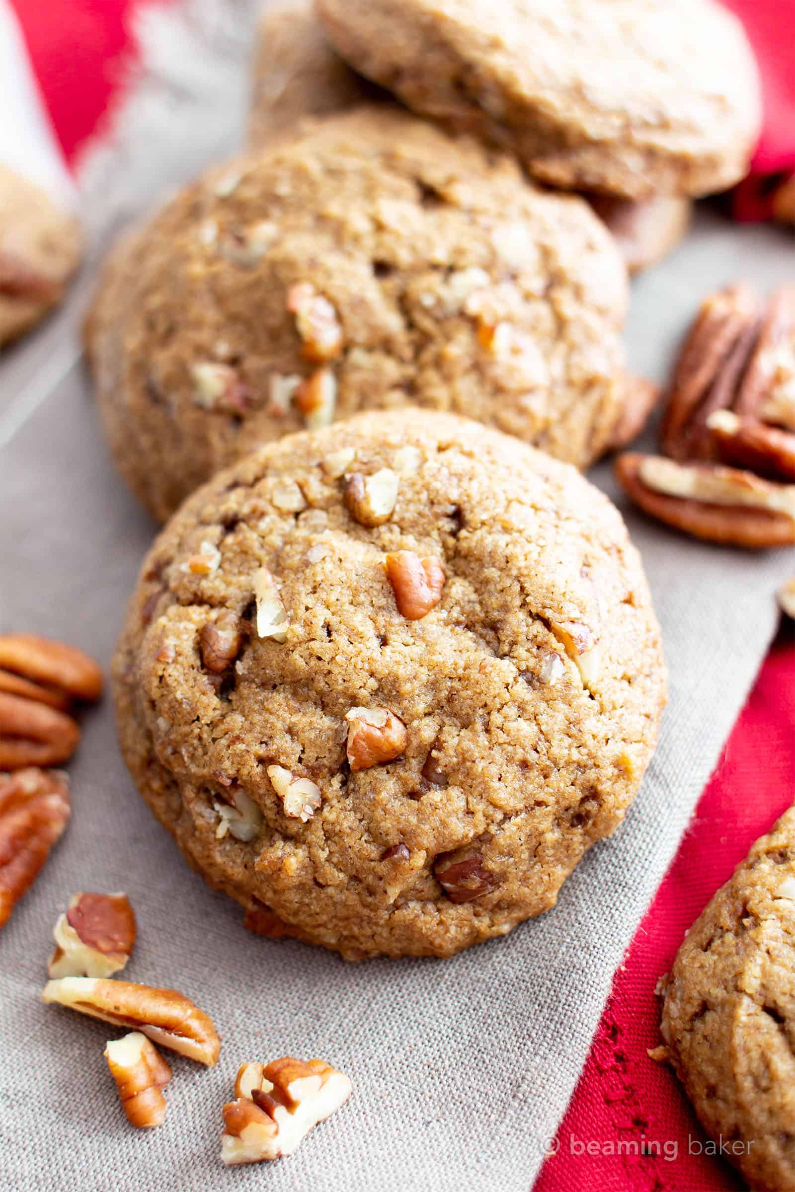 Easy Vegan Cinnamon Pecan Cookies (V, GF): a 1-bowl recipe for chewy on the outside, soft on the inside buttery gluten free pecan cookies bursting with pecan crunch and a cinnamon kick! Made with healthy ingredients. #Cookies #BeamingBaker #Vegan #GlutenFree #GlutenFreeCookies #Christmas #HealthyBaking #VeganCookies | Recipe at BeamingBaker.com