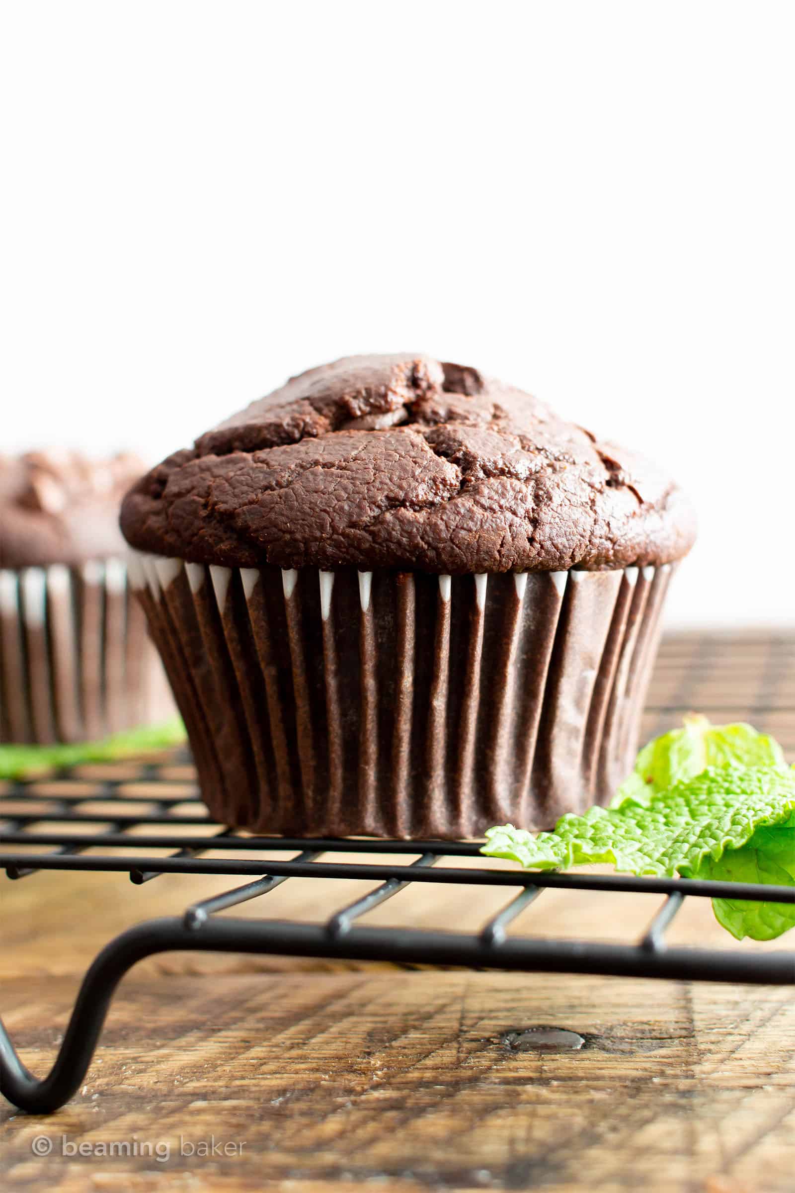 Gluten Free Moist Mint Dark Chocolate Chip Muffins (V, GF): an easy recipe for deliciously moist ‘n rich vegan dark chocolate mint muffins bursting with festive peppermint flavors & melty chocolate chips! Made with healthy ingredients. #HealthyBaking #Vegan #VeganGlutenFree #VeganBaking #Christmas #BeamingBaker #VeganChristmas #DarkChocolate #HealthyDesserts #MintChocolate | Recipe at BeamingBaker.com