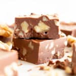 3 Ingredient Chocolate Walnut Fudge (V, GF): a 5-min recipe for thick squares of rich, velvety paleo vegan fudge packed with delicious walnuts. Made with healthy ingredients. #HealthyDesserts #Christmas #VeganGlutenFree #PaleoDesserts #VeganFudge #Fudge #BeamingBaker | Recipe at BeamingBaker.com