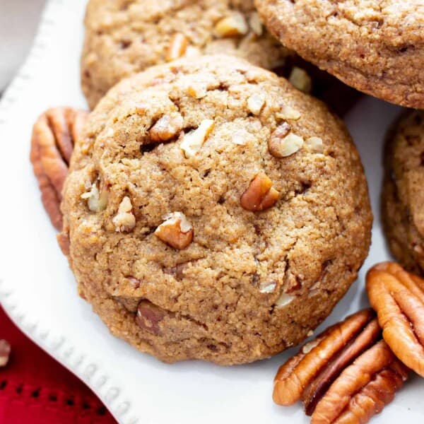 Easy Vegan Cinnamon Pecan Cookies (V, GF): an easy recipe for chewy on the outside, soft on the inside buttery gluten free pecan cookies bursting with pecan crunch and a cinnamon kick! Made with healthy ingredients. #Cookies #BeamingBaker #Vegan #GlutenFree #GlutenFreeCookies #Christmas #HealthyBaking #VeganCookies | Recipe at BeamingBaker.com