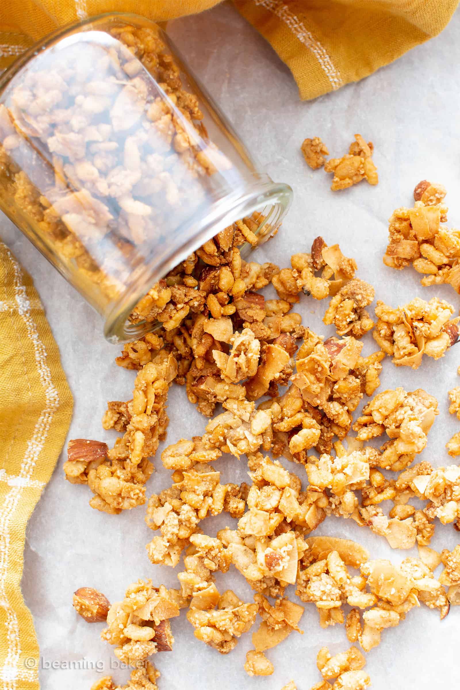 Low Calorie Granola: 5 mins of prep for the best low carb, low sugar, low fat granola! Crispy, crunchy and perfectly sweet. Only 74 calories, 3.6g of sugar and 7g carbs per serving. #LowCalorie #Granola #LowCarb #LowFat #LowSugar | Recipe at BeamingBaker.com