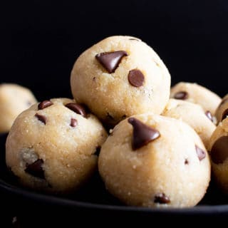 Paleo Cookie Dough Bites (V, GF): this decadent paleo edible cookie dough balls recipe is made with almond flour, just 6 healthy ingredients, easy & gluten-free! It’s the best vegan chocolate chip cookie dough bites recipe ever! #CookieDough #Paleo #Vegan #Chocolate | Recipe at BeamingBaker.com