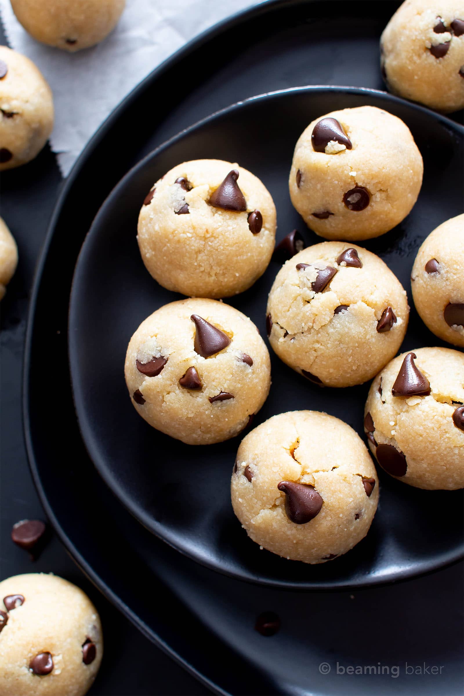 Paleo Cookie Dough Bites (V, GF): this decadent paleo edible cookie dough balls recipe is made with almond flour, just 6 healthy ingredients, easy & gluten-free! It’s the best vegan chocolate chip cookie dough bites recipe ever! #CookieDough #Paleo #Vegan #Chocolate | Recipe at BeamingBaker.com