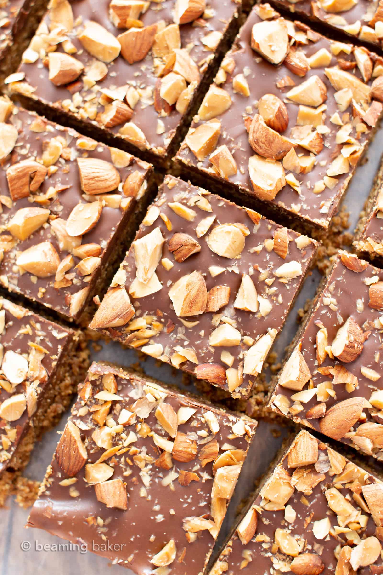 4 Ingredient No Bake Paleo Chocolate Almond Bars (V, GF): this paleo no bake chocolate almond bars recipe is so easy with just 4 ingredients! It’s the best no bake date nut bars recipe – healthy, vegan & gluten-free! #NoBake #Vegan #Paleo #Chocolate | Recipe at BeamingBaker.com