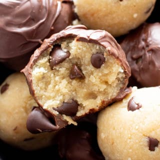 Paleo Chocolate Chip Cookie Dough Truffles (V, GF): this rich ‘n satisfying vegan cookie dough truffle recipe is perfect for gift-giving! It’s the ultimate edible paleo cookie dough dessert – easy to make and healthy! #CookieDough #Paleo #Dessert #Chocolate | Recipe at BeamingBaker.com