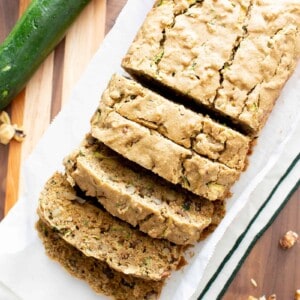 Irresistibly Moist Vegan Gluten Free Zucchini Bread Recipe (GF): this irresistible vegan zucchini bread is moist ‘n buttery. The best vegan gluten free zucchini bread—easy recipe, perfect for summer! GF. #Vegan #GlutenFree #Zucchini #Bread | Recipe at BeamingBaker.com